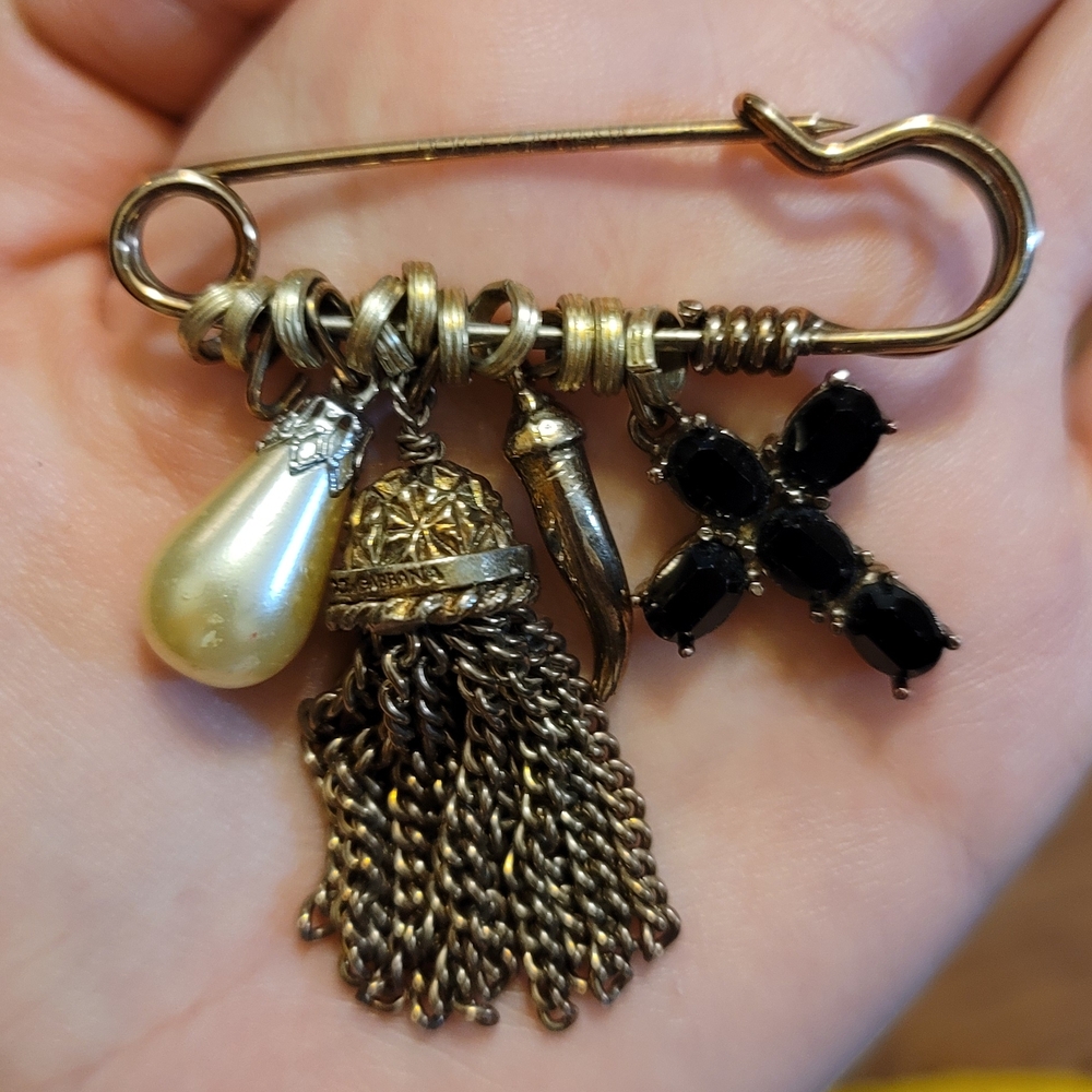 Elegant Gold and Black Charm Brooch